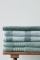 Beddinghouse badgoed Sheer Stripe en uni groen sfeer stapel