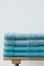 Beddinghouse badgoed Sheer petol en blauw stapel sfeer