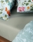 Essenza dekbedovertrek Marigold Pastel blue en Minte hoeslaken dusty green detail